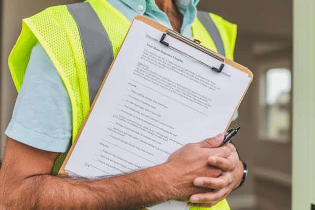 person holding a checklist