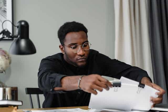 person looking at documents