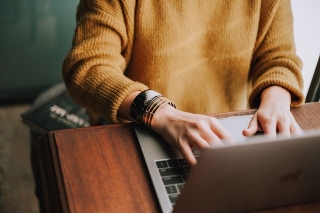 a person using their laptop